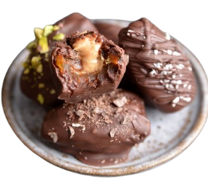 Chocolate_Covered_Peanut_Butter_Stuffed_Dates_-_Bakemas_Day_23-removebg-preview